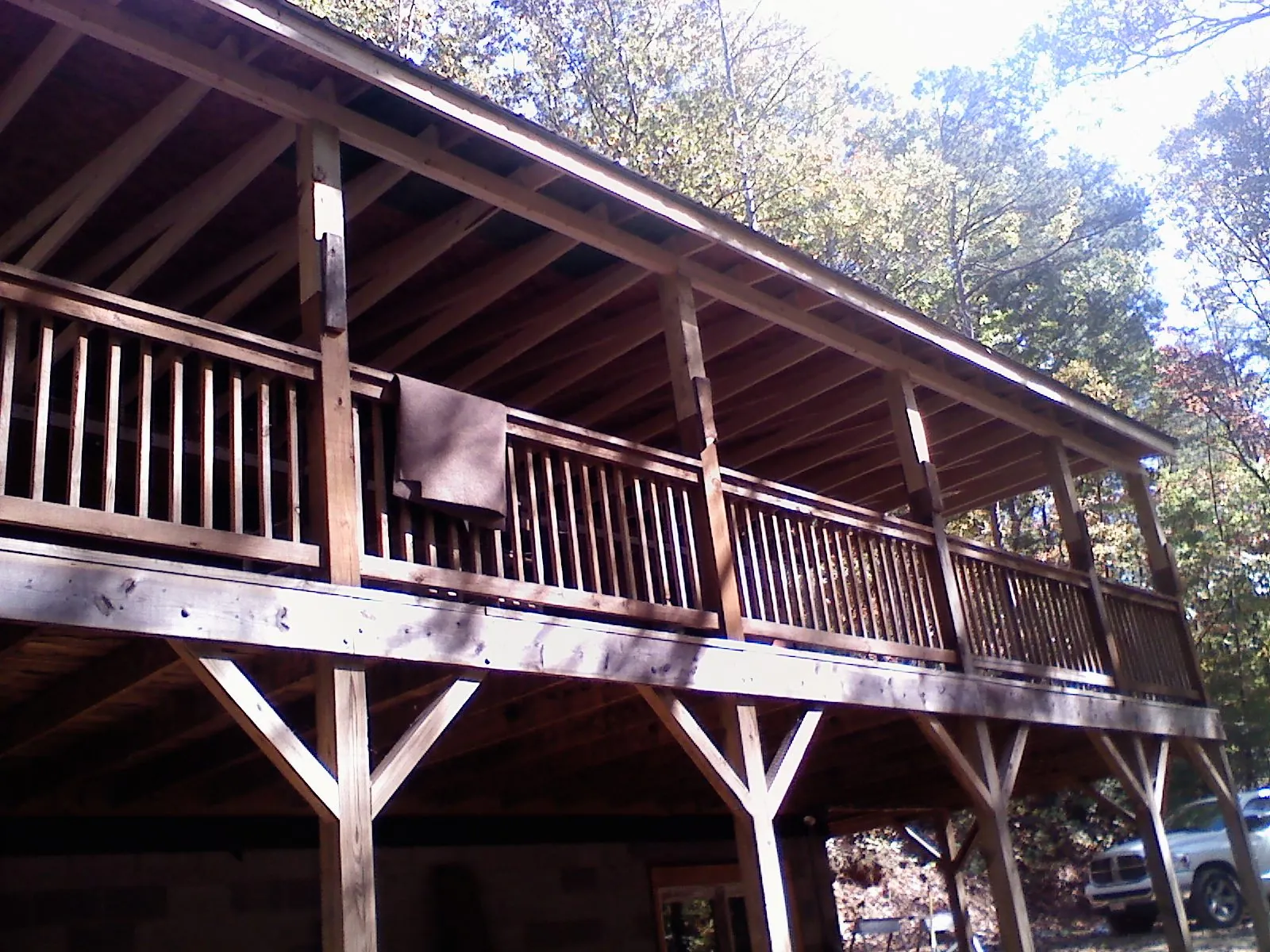 Timber framing under a new elevated porch and deck — Roof Leak Repair in Tucson by Roofing Brothers